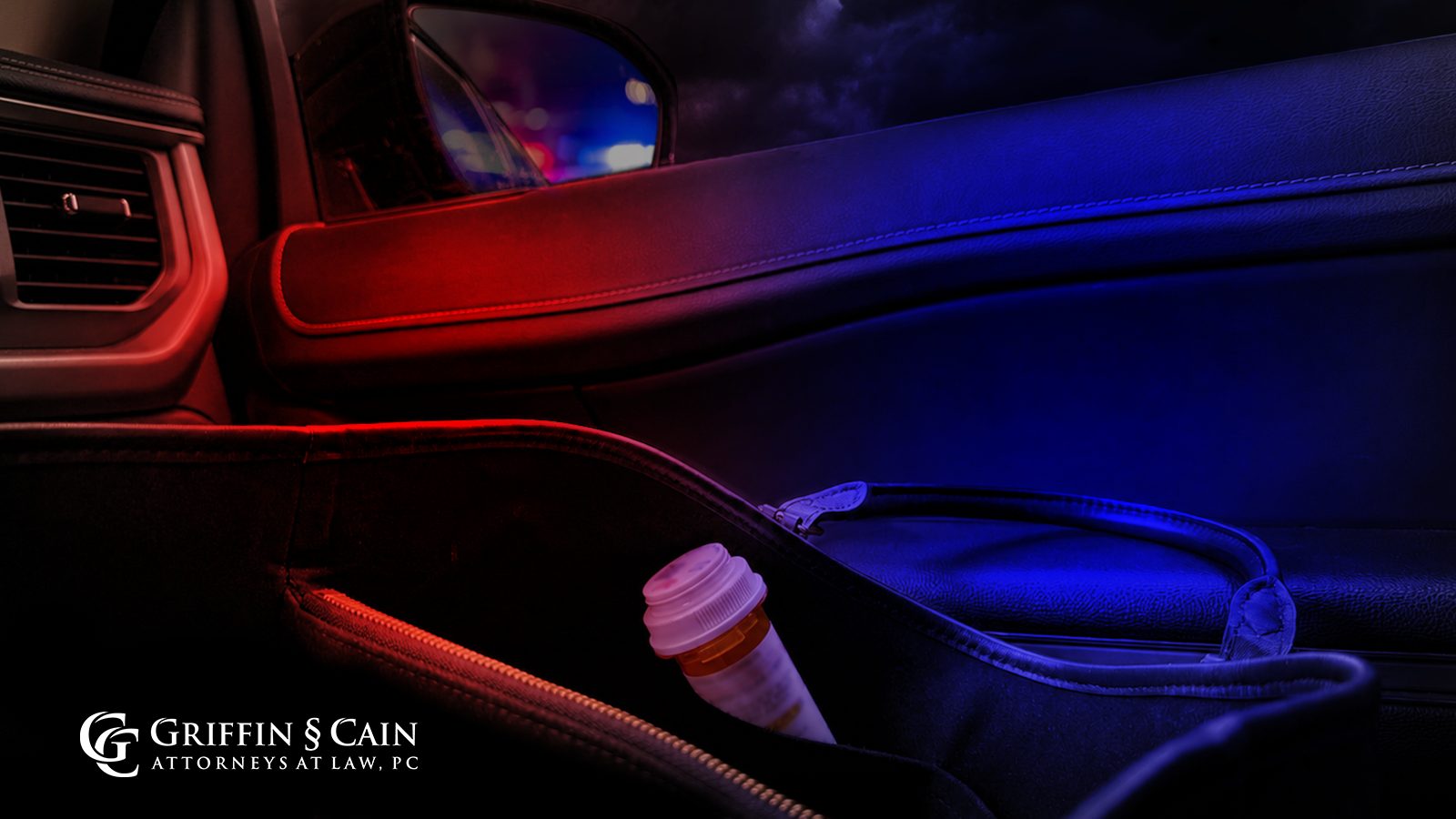 A prescription pill bottle in a car door pocket is illuminated by red and blue police lights, with the Griffin & Cain Attorneys at Law, PC logo in the lower left corner.