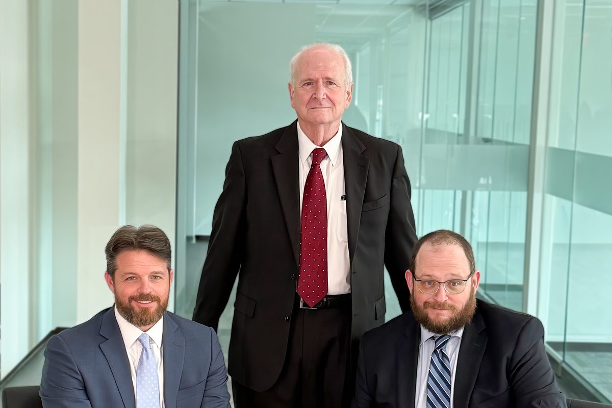 Attorneys of Griffin & Cain, Attorneys at Law, photographed together in the firm's Conroe office. Attorneys of Griffin & Cain, Attorneys at Law, photographed together in the firm's Conroe office.
